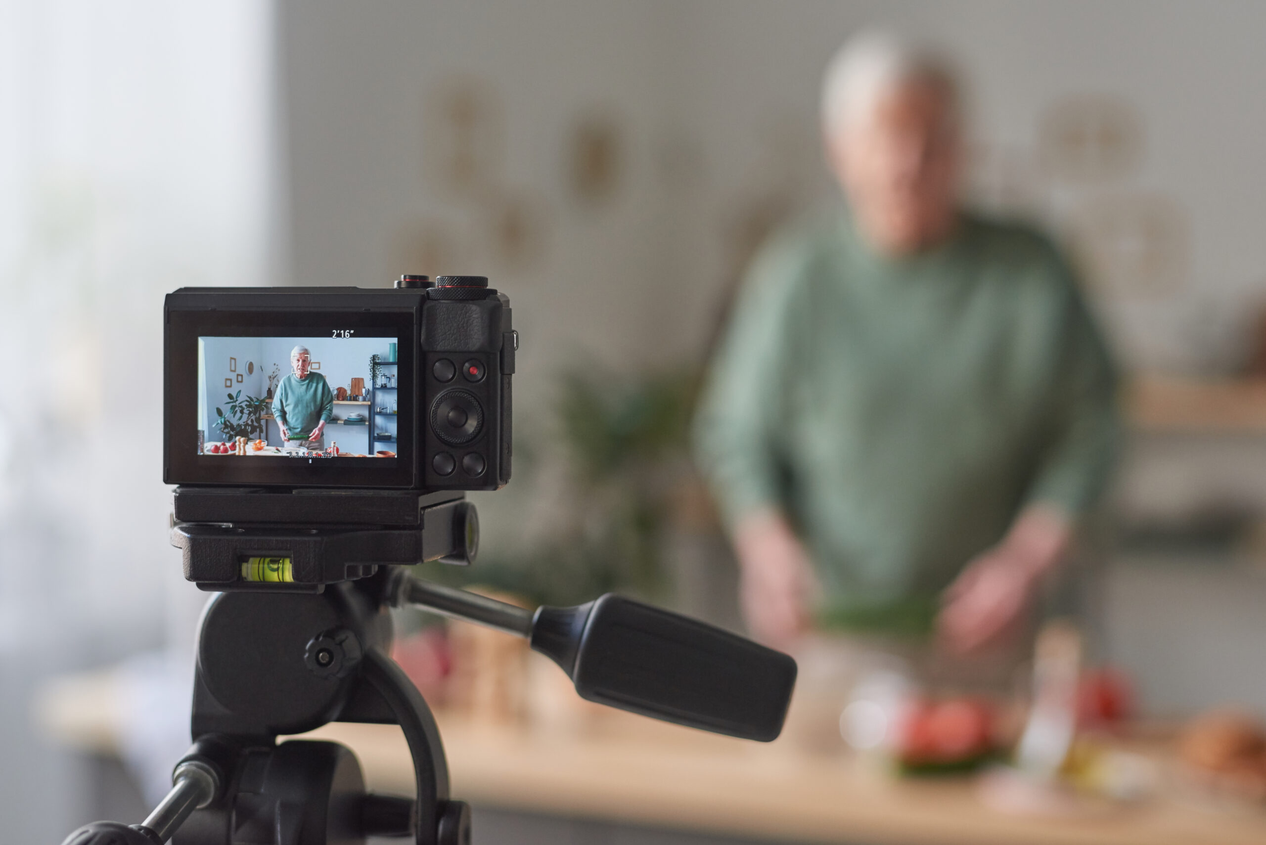 Food blogger using camera at work