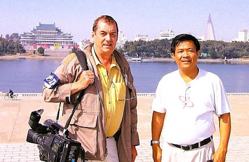 2005 in North Korea with Somyot, longtime sound recordist, trusted colleague and close friend, who worked alongside him on assignments across Asia.