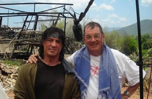 2007 Derek with Sylvester Stallone on the set of Rambo.